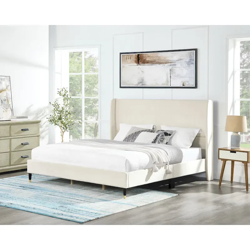 Lit plateforme beige avec tête de lit et oreilles en velours