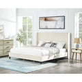 Lit plateforme beige avec tête de lit et oreilles en velours