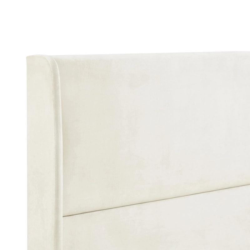 Lit plateforme beige avec tête de lit et oreilles en velours