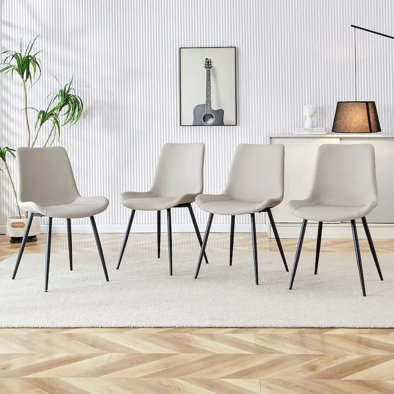 Chaises de restaurant capitonnées avec dossiers en daim et pieds en métal noir