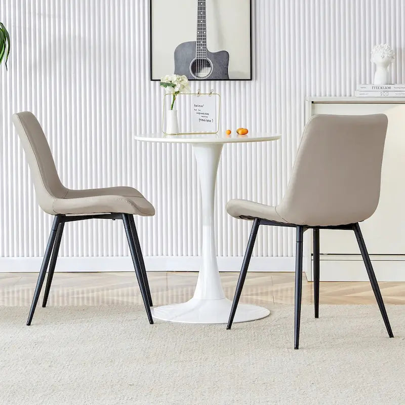 Chaises de restaurant capitonnées avec dossiers en daim et pieds en métal noir