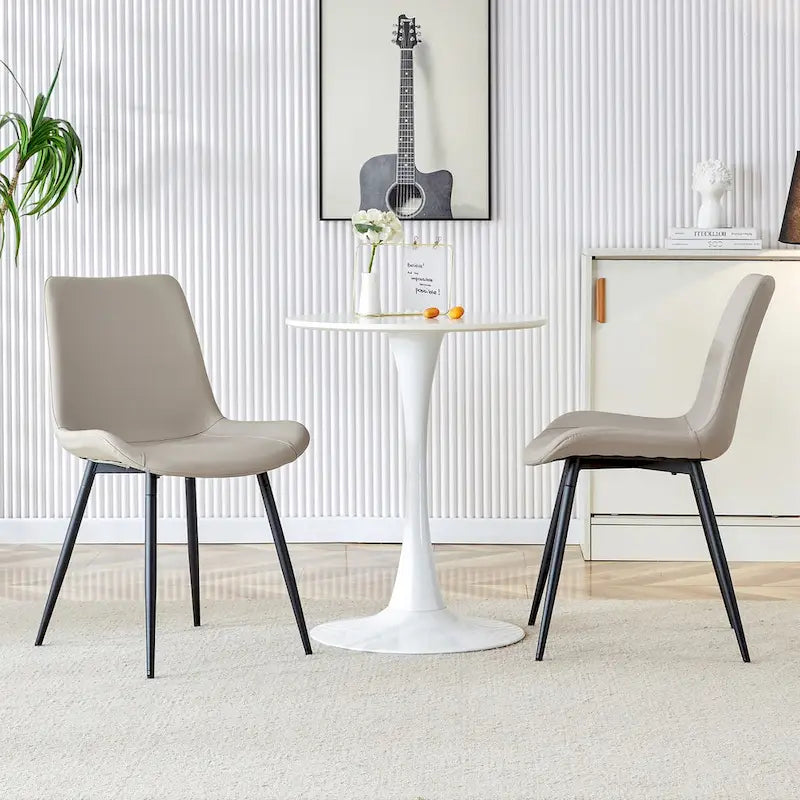 Chaises de restaurant capitonnées avec dossiers en daim et pieds en métal noir